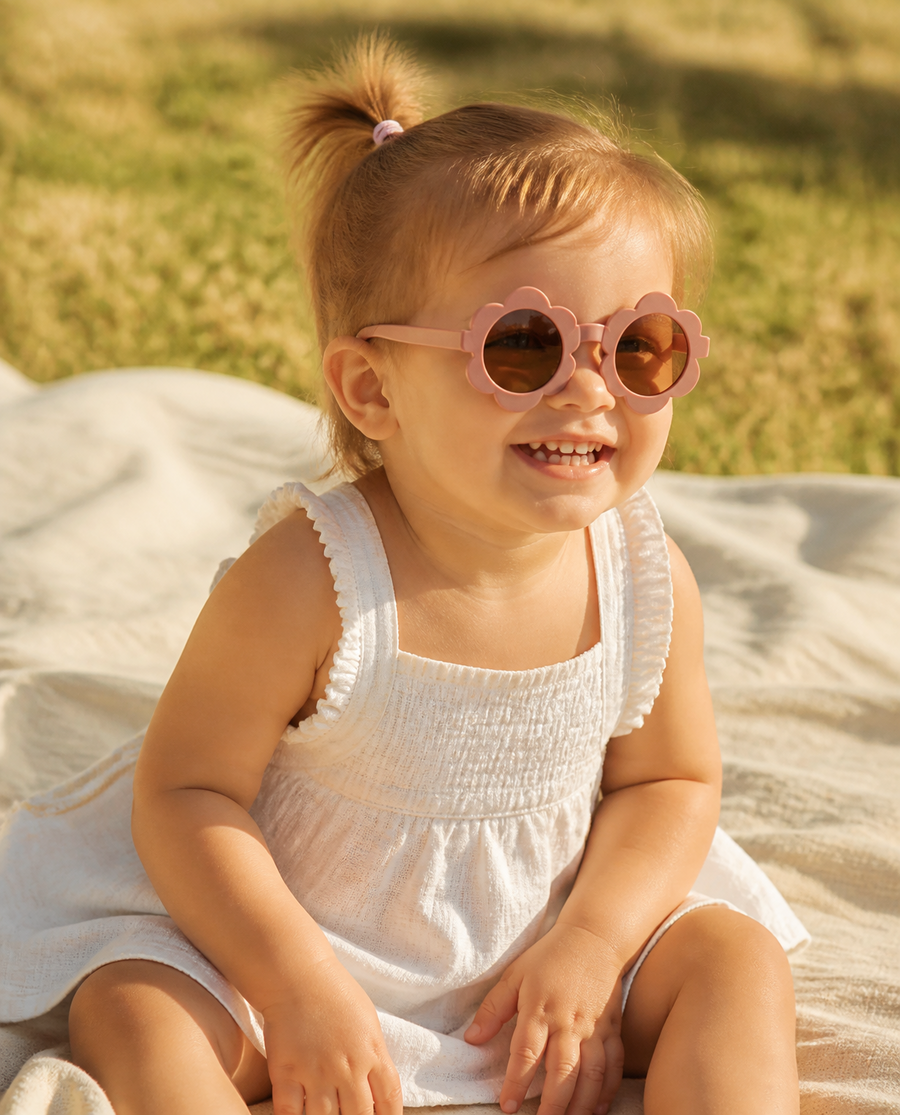 Toddler in flower sunglasses
