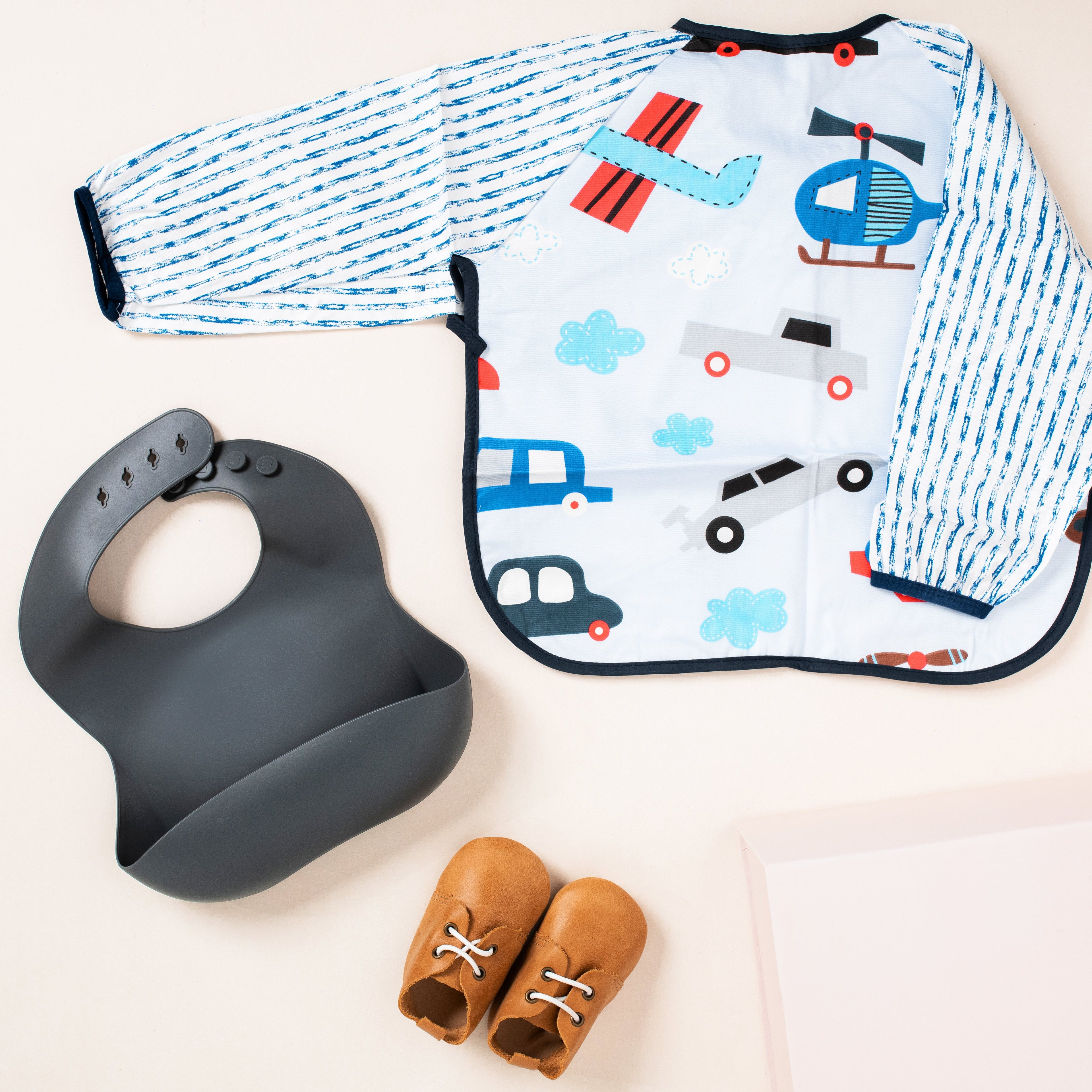 Smock vs Bib: The Definitive Guide for Messy Feeders