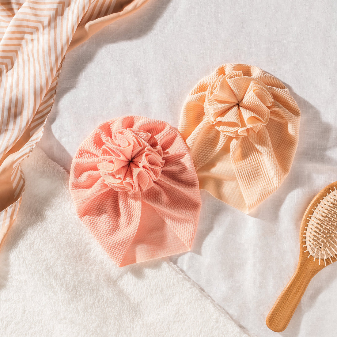 The History of the Baby Turban (And Why They're Having a Moment)