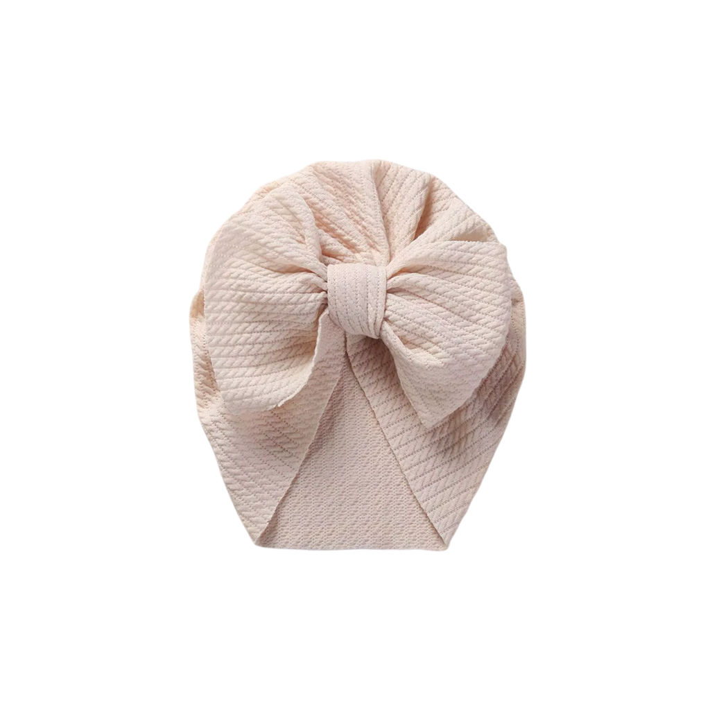 Ivory textured baby turban with bow detail — Billie Bow Turban on white background