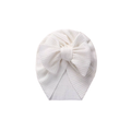 Snow white textured baby turban with bow detail — Billie Bow Turban on white background
