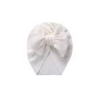 Snow white textured baby turban with bow detail — Billie Bow Turban on white background