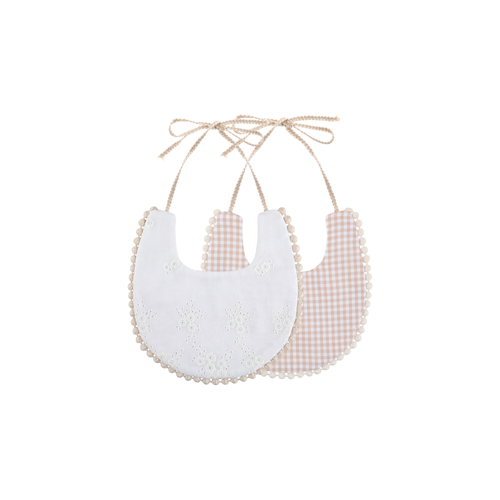 2 piece Clementine pom pom baby dribble bibs in beige gingham: white broderie bib and beige gingham bib