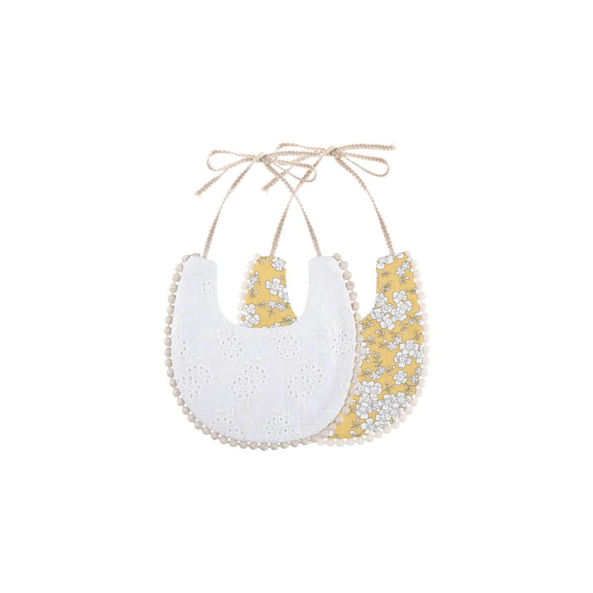 2 piece Clementine pom pom baby dribble bibs in lemon floral: white broderie bib and honey yellow floral print bib