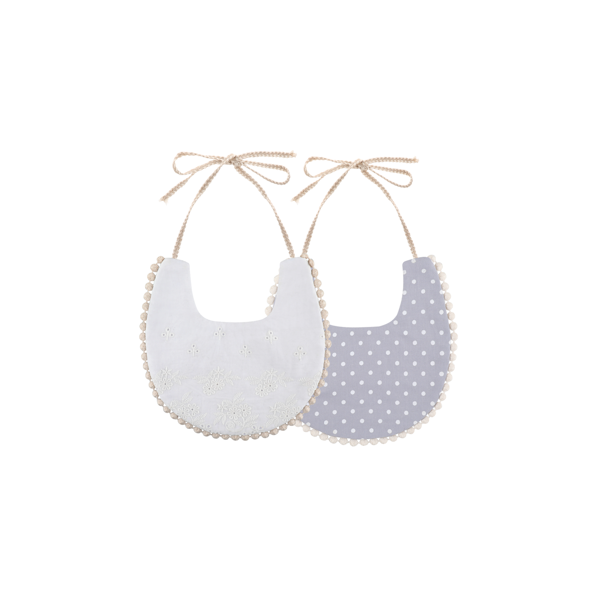 2 piece Clementine pom pom baby dribble bibs in pale grey spot: white broderie bib and pale grey polka dot print bib