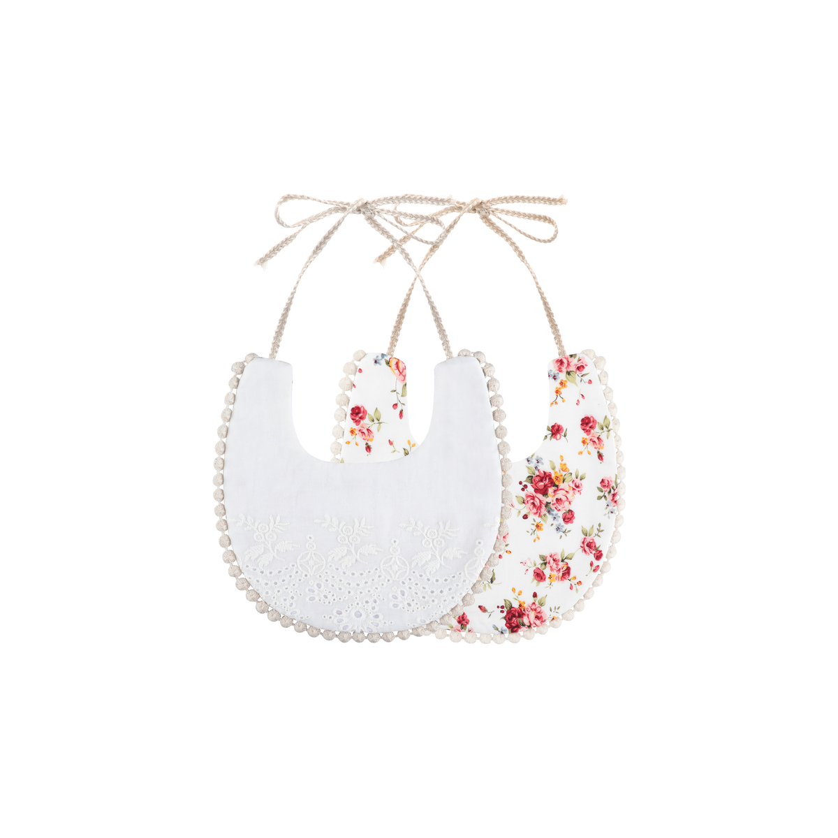 2 piece Clementine pom pom baby dribble bibs in punch floral: white broderie bib and pink and red rose print bib