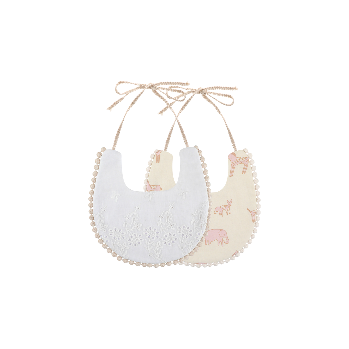 2 piece Clementine pom pom baby dribble bibs in sand safari: white broderie bib and sand animal print bib