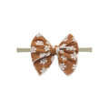 Toffee bloom nylon oversized bow baby headband — Frankie Bow Headband on white background