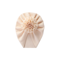 Cream rosette baby turban — Rosette Baby Turban on white background