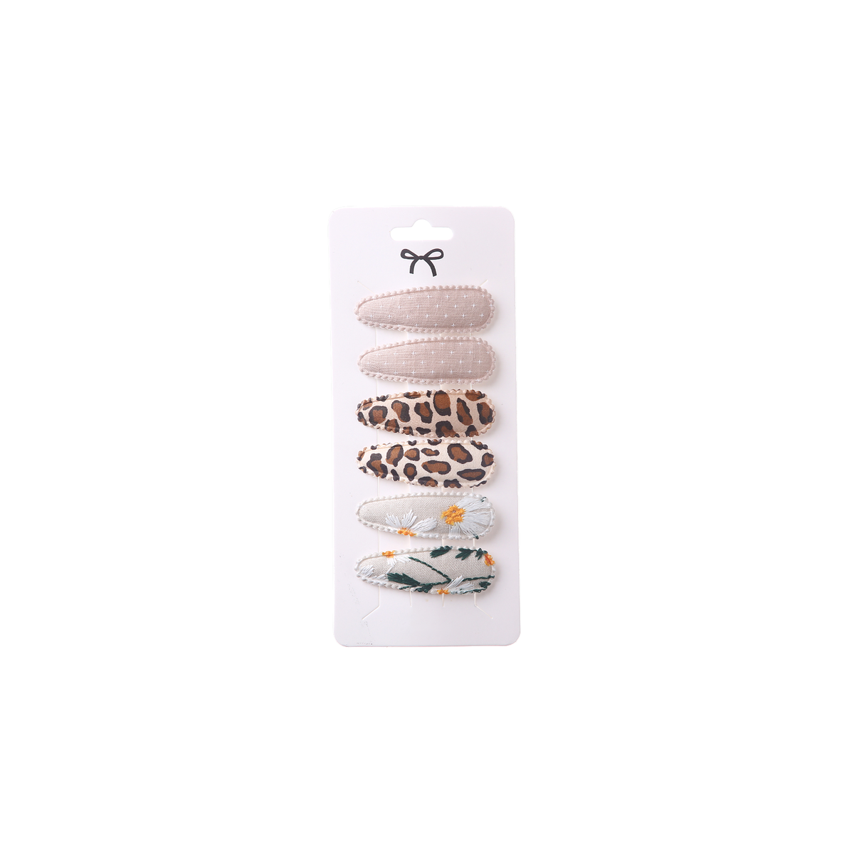 6 piece Kiki baby snap hair clips in cheetah, oat linen, leopard print and daisy embroidery, on a card