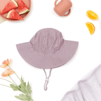 Baby wearing antique rose baby hat — Wide Brim Baby Sun Hat
