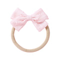 Fairy floss cotton embroidered baby accessory — Dotty Embroidered Cotton Baby Bow on white background