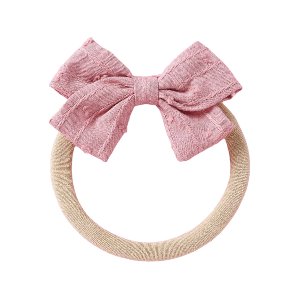 Dotty Embroidered Cotton Baby Bow in Sage — sage baby accessory product styling