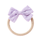 Dotty Embroidered Cotton Baby Bow in Strawberry — baby accessory size and scale reference