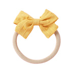 Dotty Embroidered Cotton Baby Bow in Fairy Floss — fairy floss baby accessory colour swatch detail
