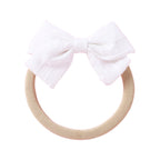 Dotty Embroidered Cotton Baby Bow in Fairy Floss — fairy floss baby accessory colour swatch detail