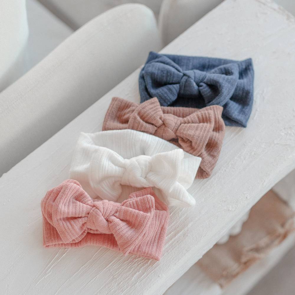 Baby girl wearing navy baby headband with bow — Baby Light Knit Single Soft Bow Knot Headband