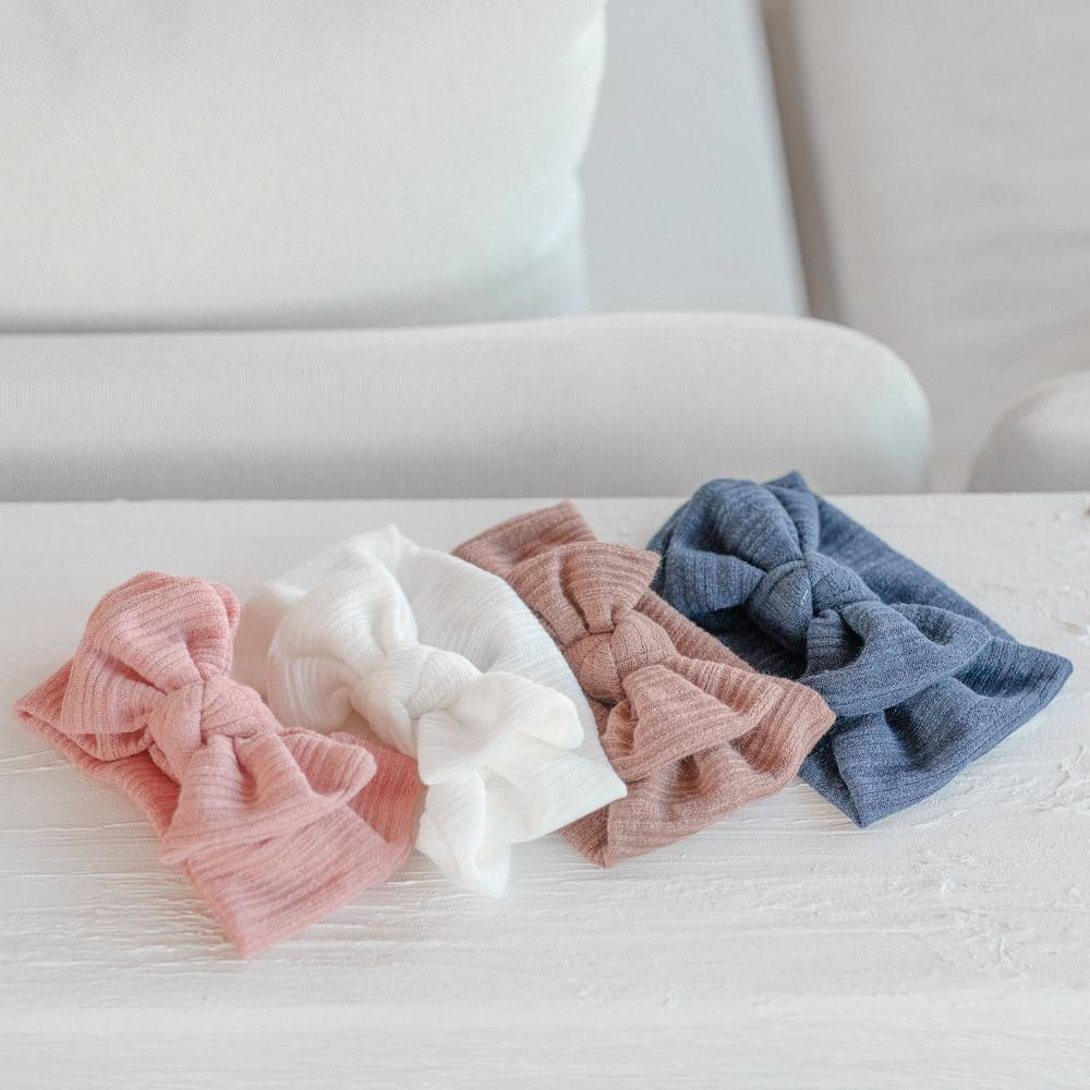 Baby girl wearing navy baby headband with bow — Baby Light Knit Single Soft Bow Knot Headband