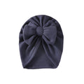 Navy knit textured baby turban with bow detail — Baby Girl Waffle Bow Turban on white background