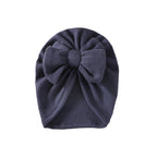 Navy knit textured baby turban with bow detail — Baby Girl Waffle Bow Turban on white background