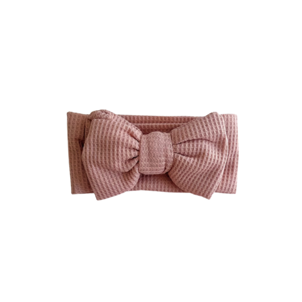 Blush knit oversized bow baby headband — Winnie Waffle Headband on white background