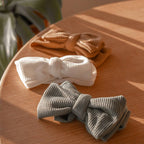 Winnie Waffle Headband in Sand — close-up of oversized bow on sand baby headband