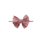 Blush nylon textured baby headband with bow detail — Baby Mini Textured Bow Headband on white background