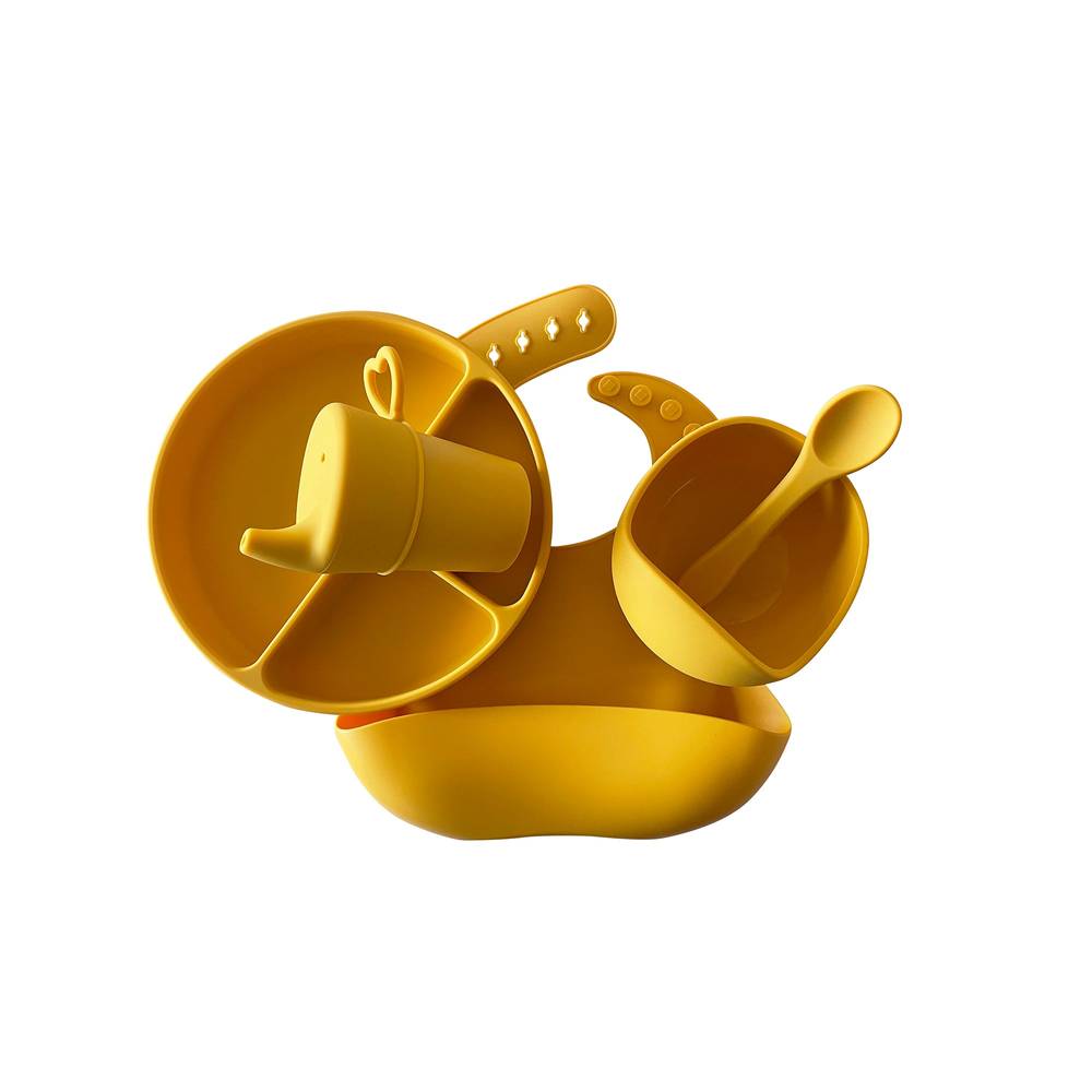 Baby wearing honey gold baby bib during mealtime — Silicone Baby Feeding Set