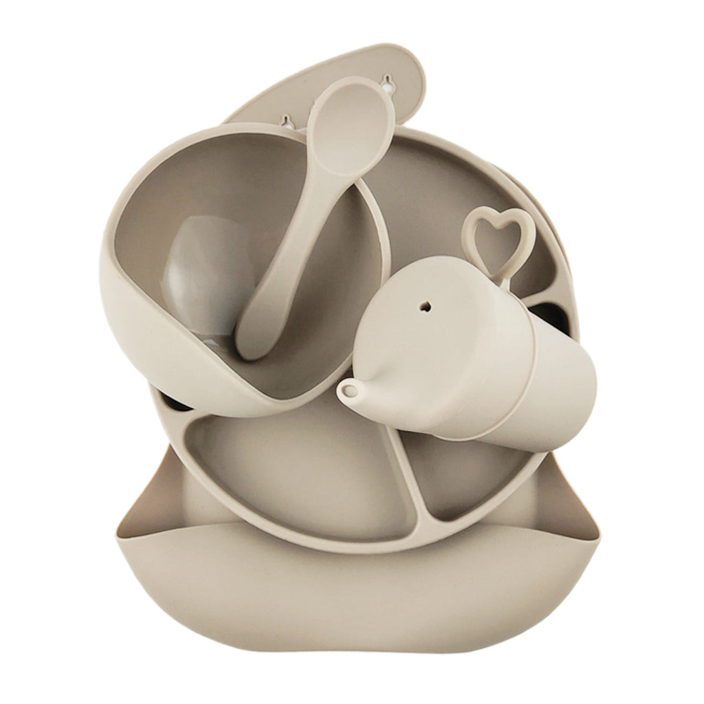 Silicone Baby Feeding Set in Sand Dune — cat baby bib showing face and soft texture