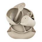Silicone Baby Feeding Set in Sand Dune — cat baby bib showing face and soft texture