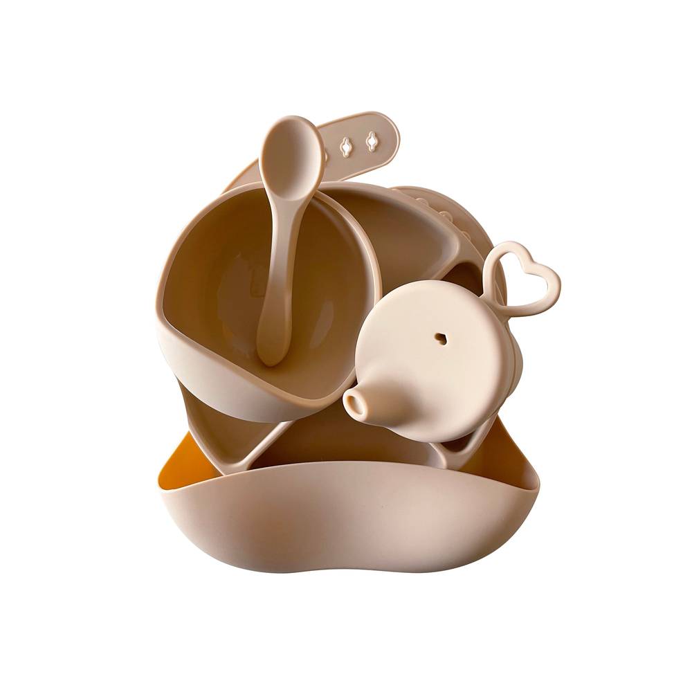 Silicone Baby Feeding Set in Walnut Cream — cat baby bib showing face and soft texture