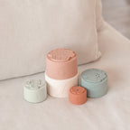 Baby wearing pastel baby hat — Silicone Baby Stacking Cups Bath & Beach