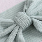 Bambi Soft Bow Headband in Power Blue — close-up showing nylon texture and craftsmanship