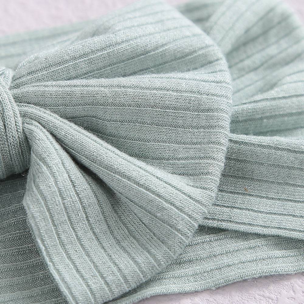 Baby girl wearing power blue baby headband with ear detail — Bambi Soft Bow Headband