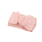 Baby Toddler Big Bow Ariel Headwrap Headband Soft in White — baby headband styled flat lay with nursery accessories