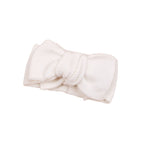 Baby Toddler Big Bow Ariel Headwrap Headband Soft in Chocolate — baby headband styled flat lay with nursery accessories