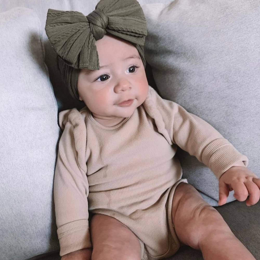 Bowie Double Bow Headband in Sage Green — baby headband close-up showing nylon