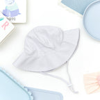 Baby wearing bright white baby hat — Wide Brim Baby Sun Hat