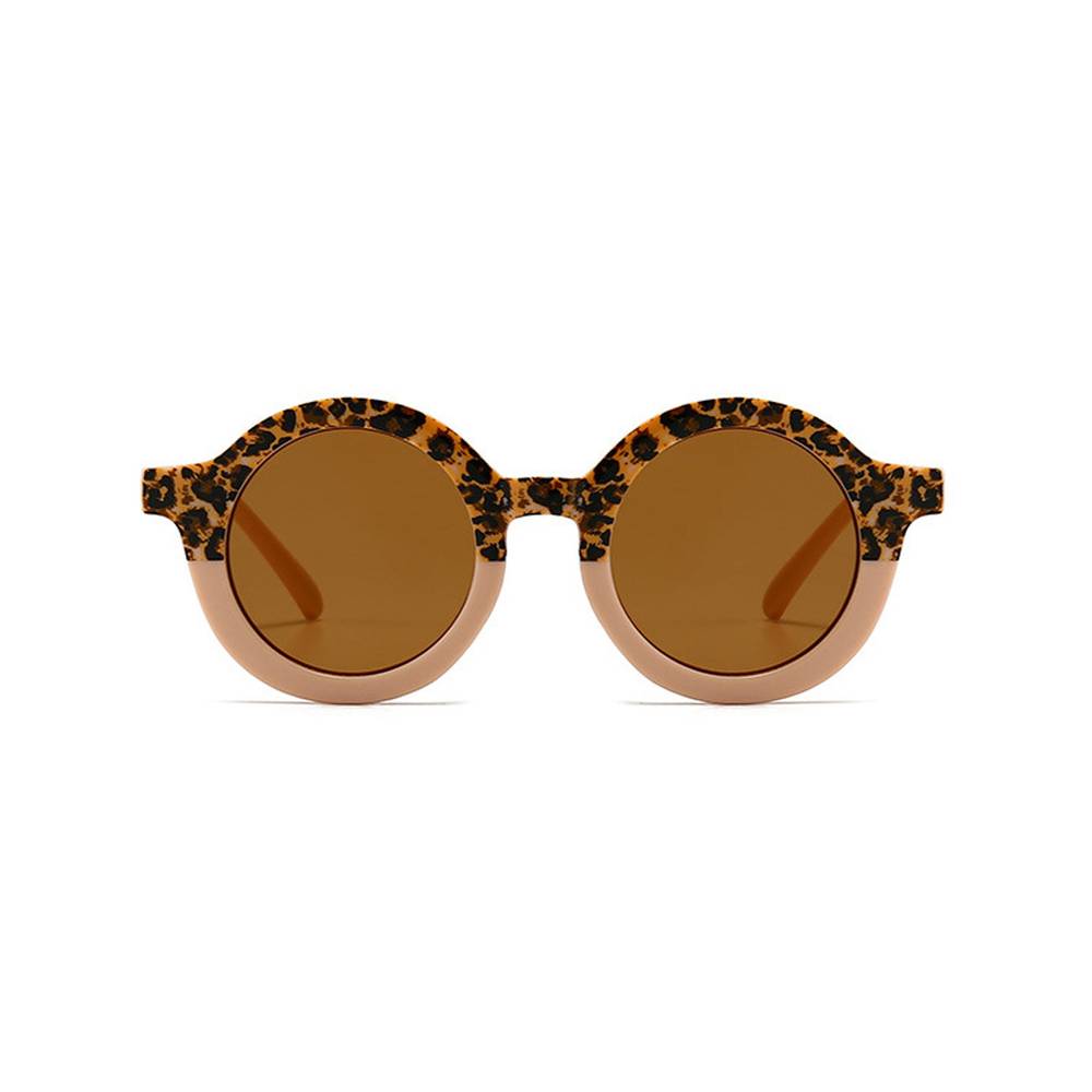 Coral Leopard Ava Baby Sunglasses — close-up of leopard print on baby sunglasses