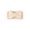 Cream lace floral baby headband with bow detail — Harlow Lace Bow Headband on white background
