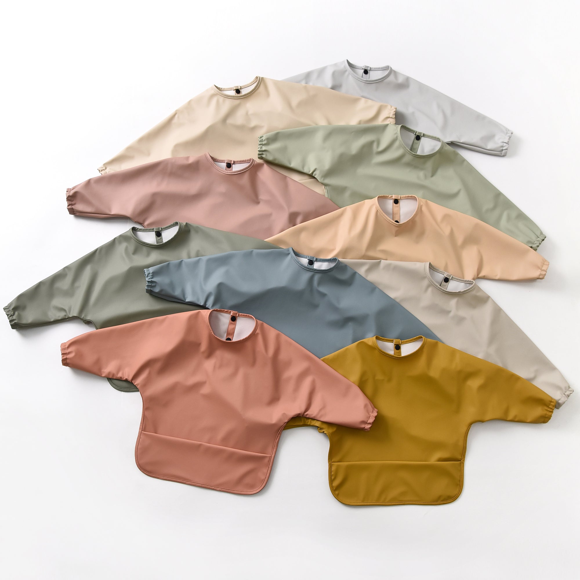 Baby wearing baby bib during mealtime — Green Smoke Waterproof Baby Smock Bib Long Sleeve