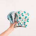 Check baby gift set — "Georgie Porgie" Dino Nappy Trio — Unisex Baby Gift Bundle on white background