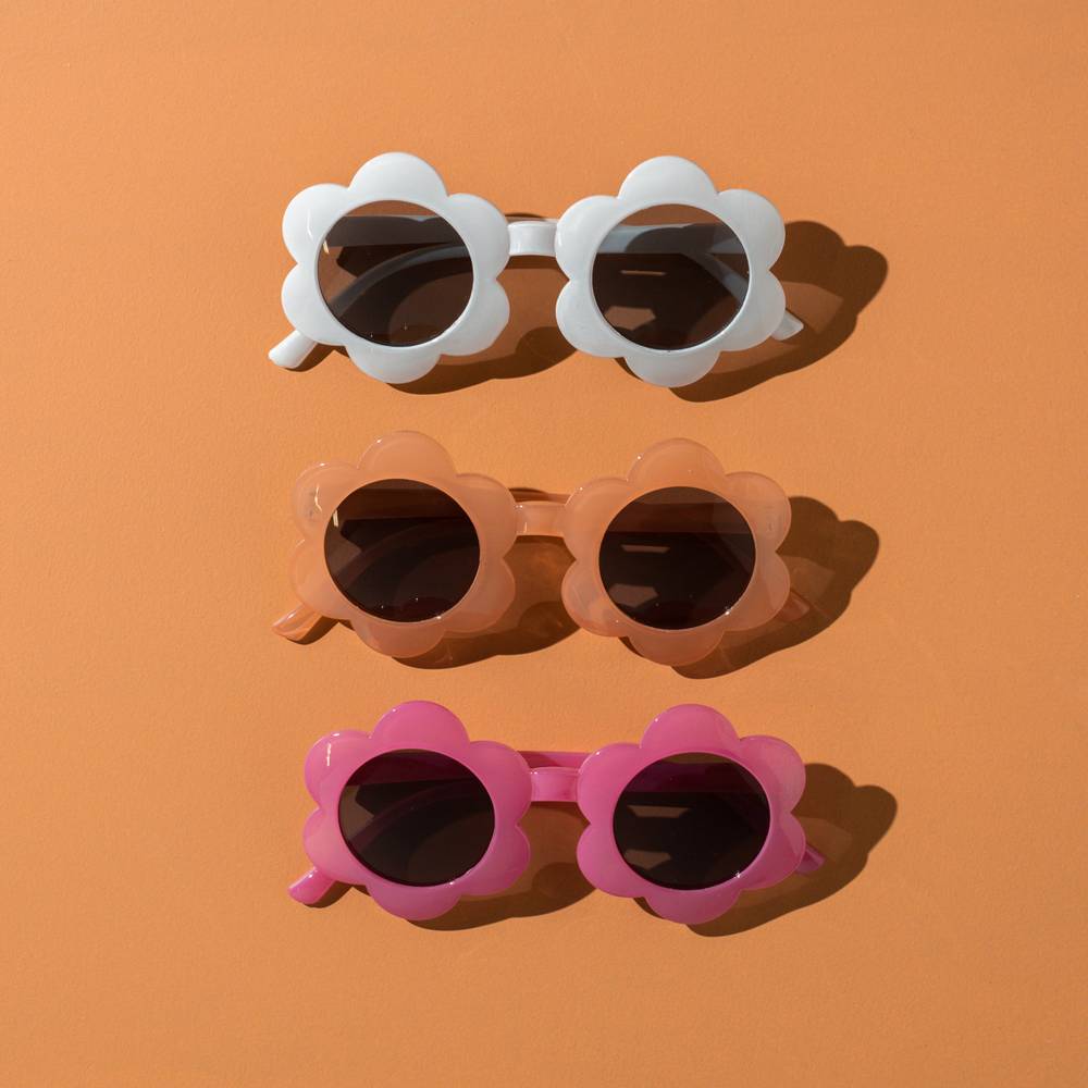 June Flower in Blush Sunglasses — baby sunglasses side view showing frame shape and lens