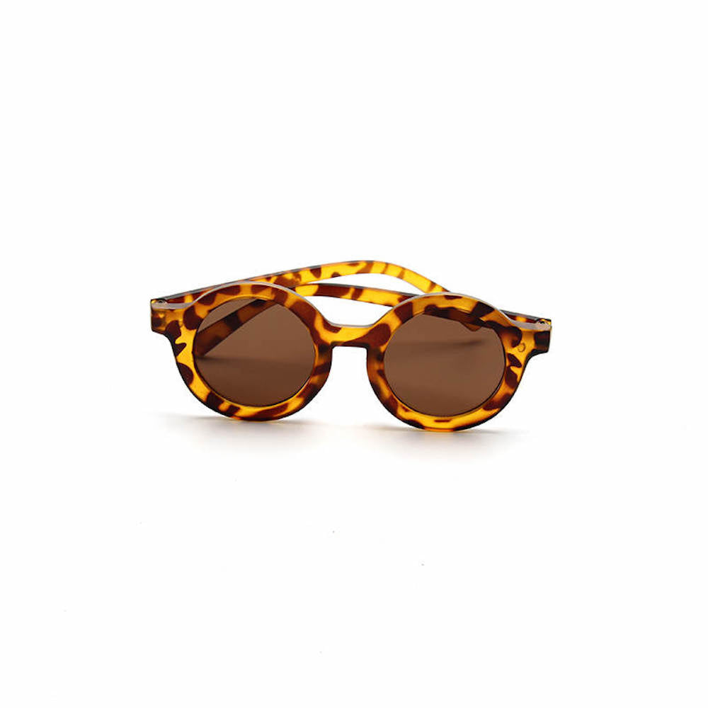 Toddler wearing baby sunglasses in sunlight — Tortoise Shell Ava Baby Sunglasses