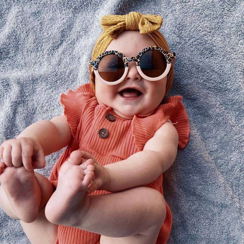 Coral Leopard Ava Baby Sunglasses — baby sunglasses side view showing frame shape and lens