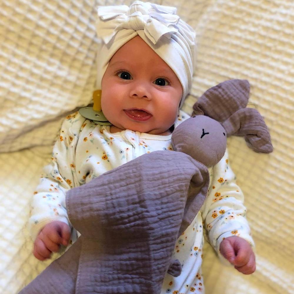 Benni Bunny Cotton Baby Comforter in Mauve — bunny baby comforter showing face and soft texture