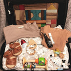 Gingerbread Weave Leather Baby Sandal — baby sandals styled flat lay with nursery accessories