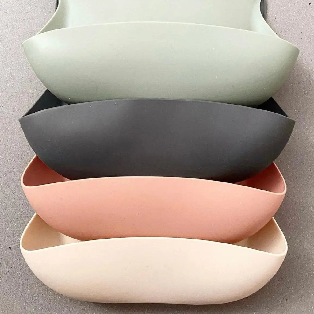 Silicone Waterproof Baby Bib in Chalet Green — cat baby bib showing face and soft texture