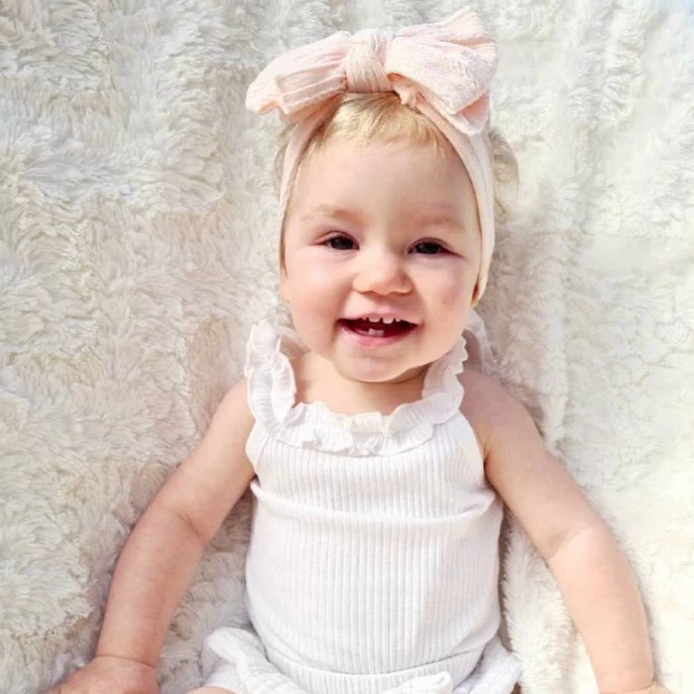 Bowie Double Bow Headband in Fairy Floss Pink — fairy floss pink baby headband colour swatch detail