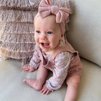 Bambi Soft Bow Headband in Flamingo Pink — baby headband close-up showing nylon